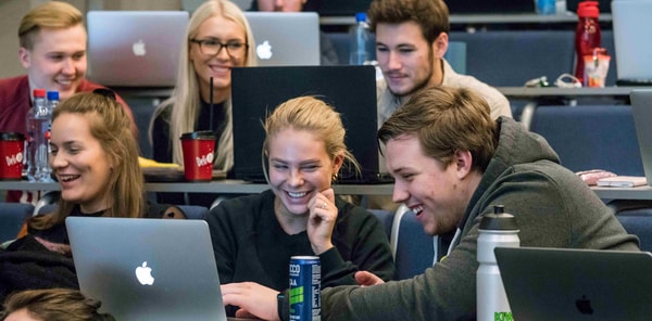 Students reacting to their results partway through a simulation